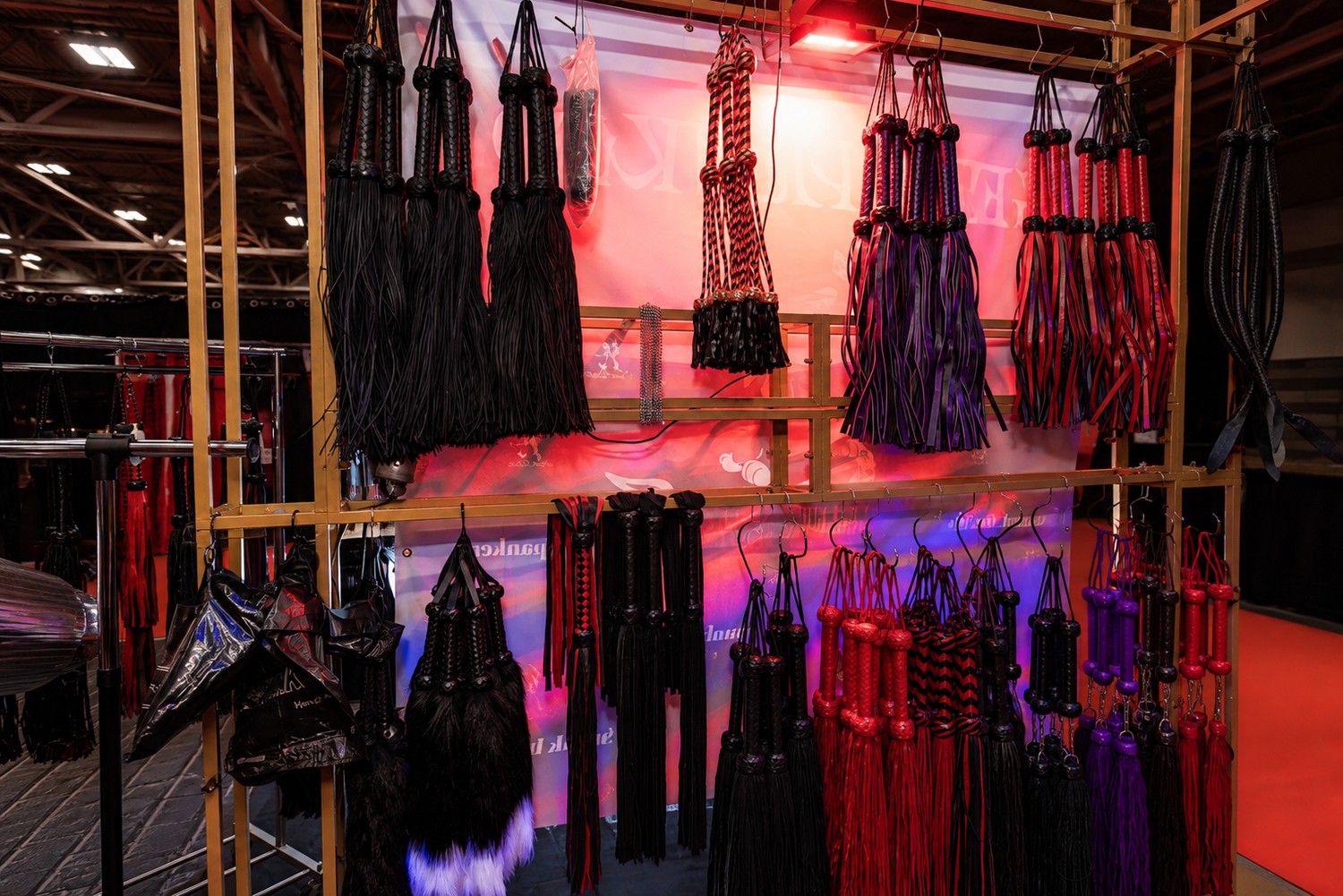Person-free display of floggers used in Spank Daddy education and trade show settings